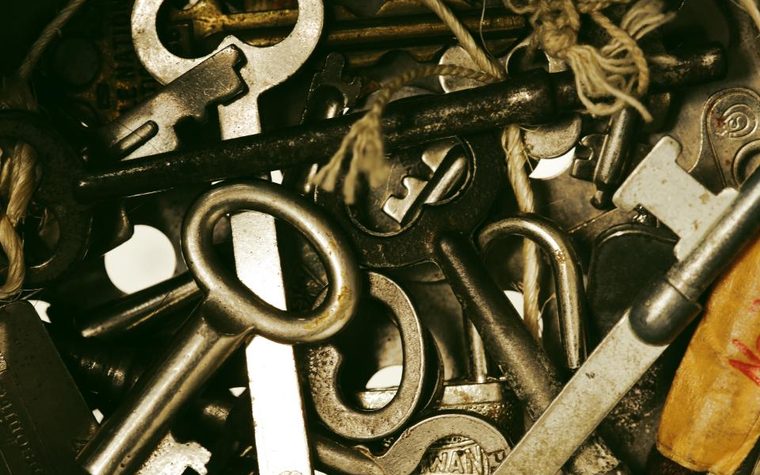 A cluster of old brass keys